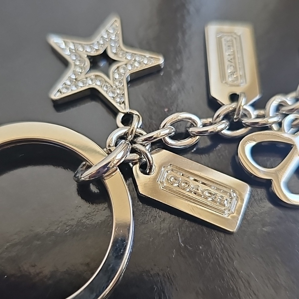 Coach NWOT Silver Keychain with Heart, Star, and Butterfly Charms - Picture 5 of 7